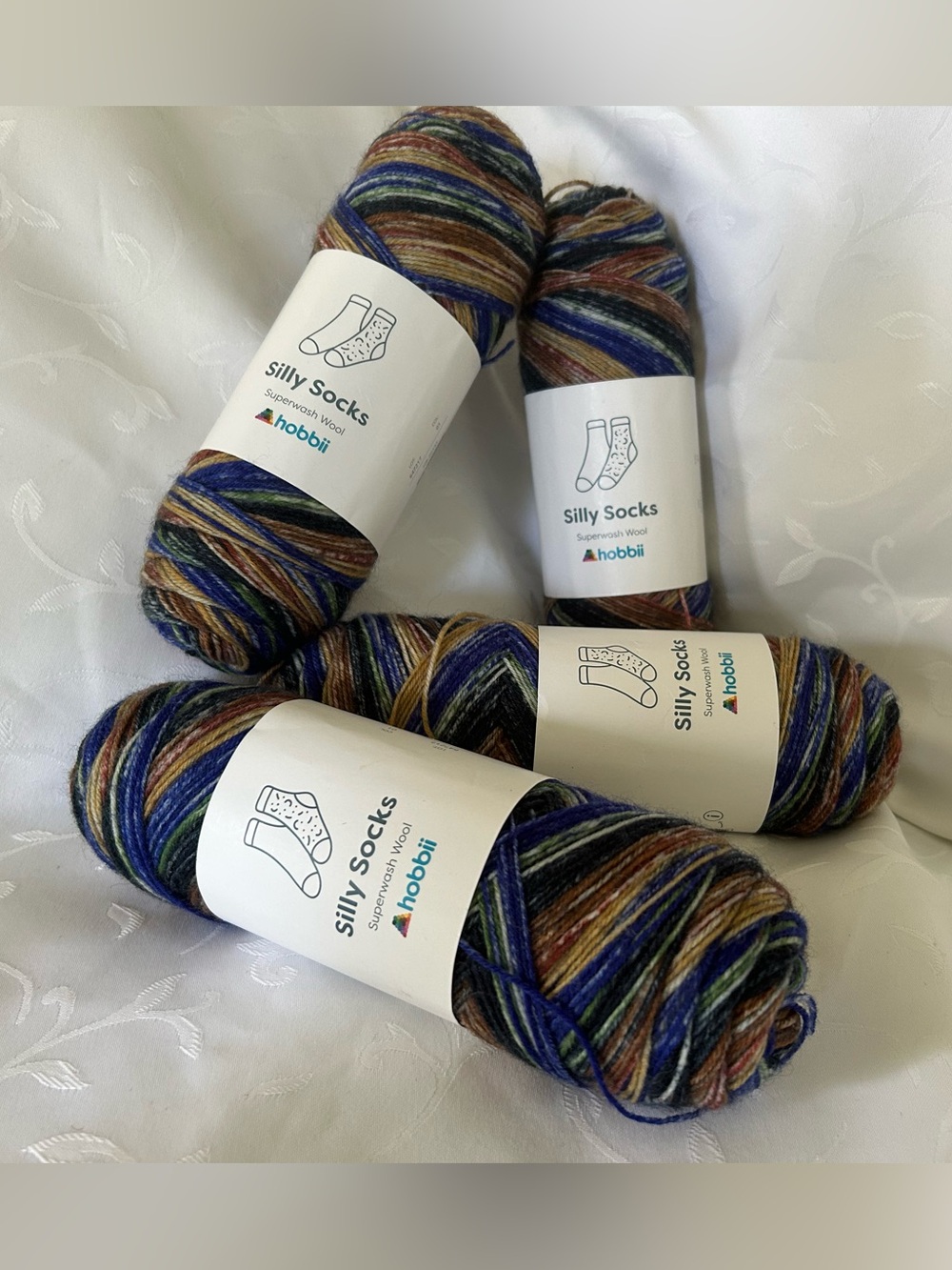 Hobbii yarn lot: Silly Socks Multicolor Superwash Wool Yarn - 4-Pack
